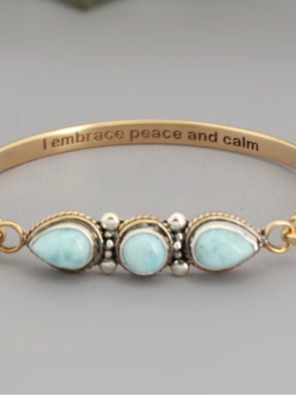 Gold Tone Inspirational Bracelet with Light Blue Stone Accents
